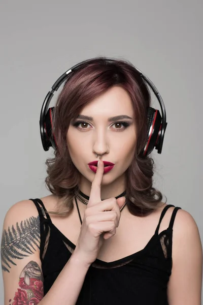 Woman showing silence sign — Stock Photo