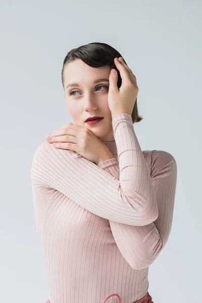 Mujer reflexiva en ropa retro - foto de stock