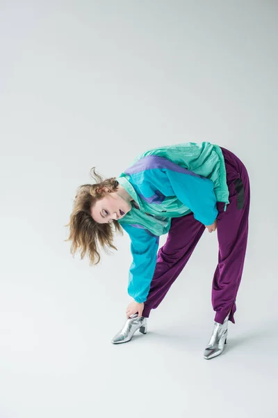 Young girl in vintage windcheater suit — Stock Photo