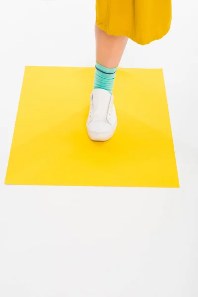 Female foot in sneaker — Stock Photo