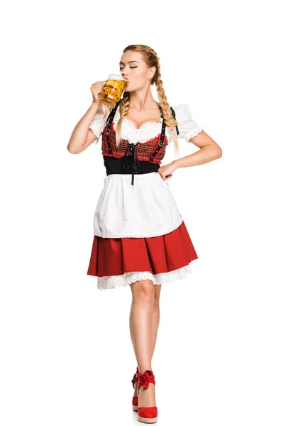 German girl drinking beer — Stock Photo