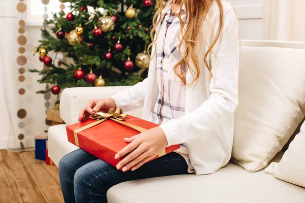 Teenager with christmas present — Stock Photo