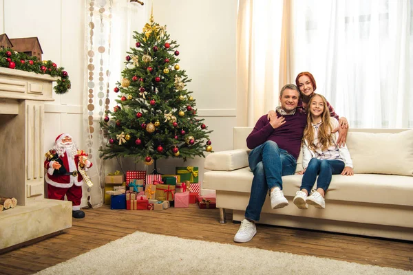 Happy family at christmastime — Stock Photo