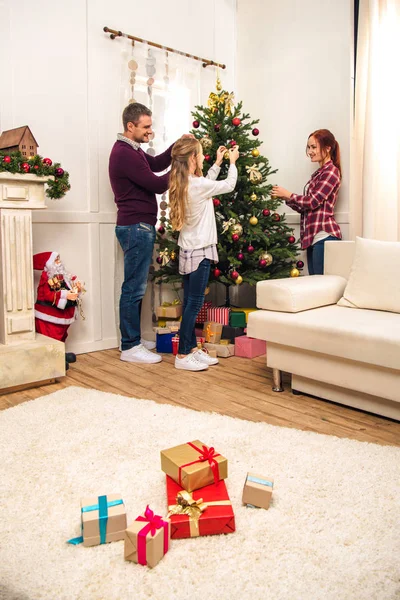 Family decorated christmas tree — Stock Photo
