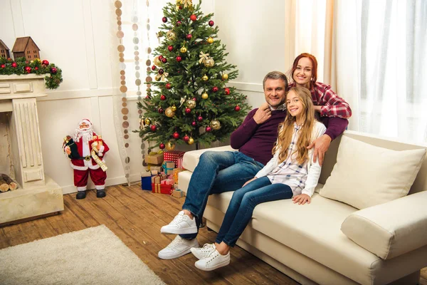Happy family at christmastime — Stock Photo