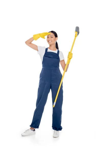 Asian cleaner with broom — Stock Photo