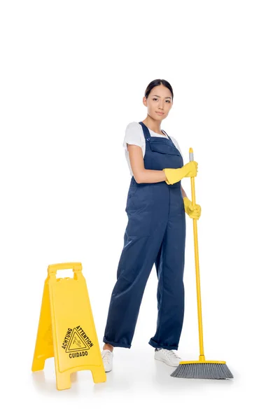 Asian cleaner with broom — Stock Photo