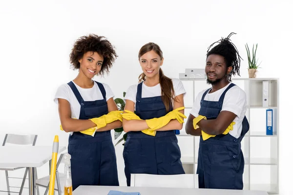 Multiethnic group of professional cleaners — Stock Photo