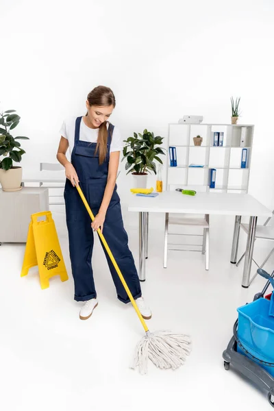 Young cleaner with mop — Stock Photo