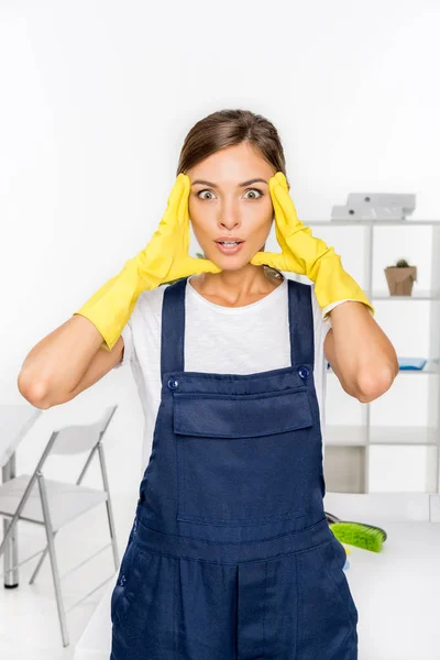 Shocked female cleaner — Stock Photo