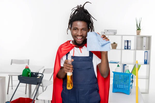 African american cleaner in superhero costume — Stock Photo