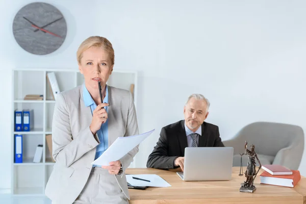 Business partners doing paperwork — Stock Photo