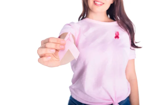 Woman holding pink ribbon — Stock Photo