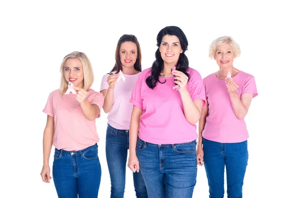 Women in pink t-shirts with ribbons — Stock Photo