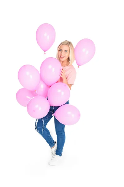 Jovem mulher com balões rosa — Fotografia de Stock