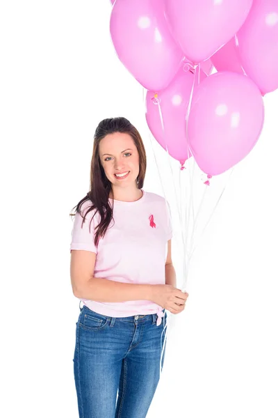 Giovane donna con palloncini rosa — Foto stock