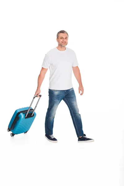 Handsome traveler with luggage — Stock Photo