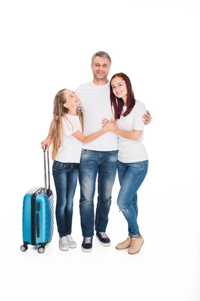 Familia de turistas con equipaje - foto de stock