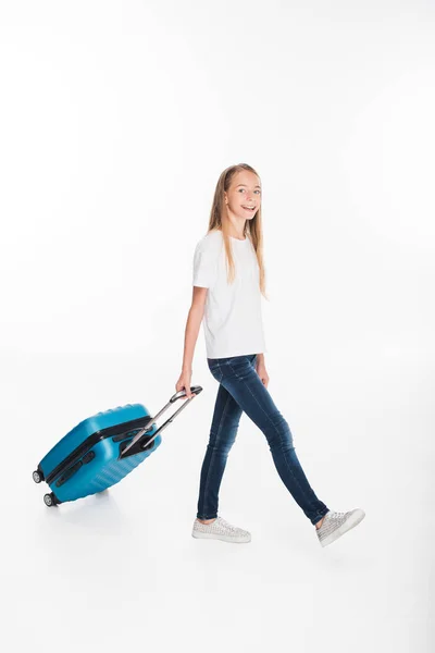 Female child with luggage — Stock Photo