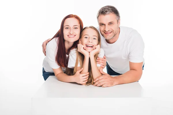 Hugging young family — Stock Photo