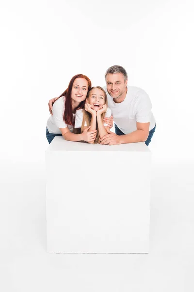 Hugging young family — Stock Photo