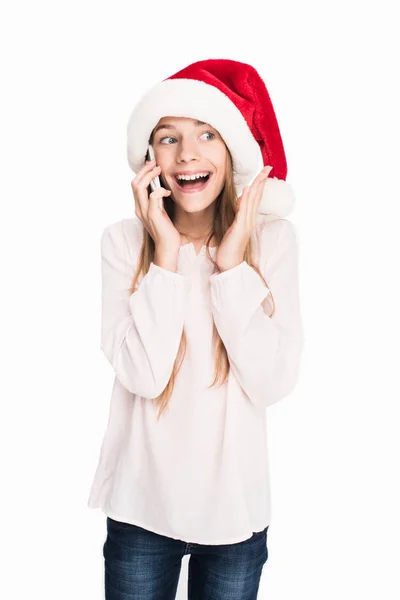 Teenager in santa hat taking selfie — Stock Photo