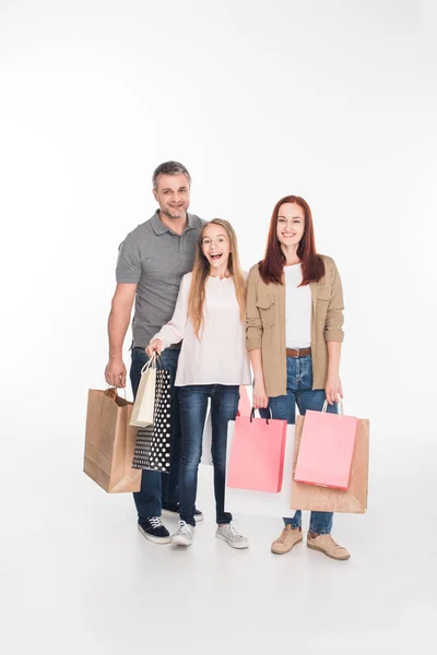 Familie mit Einkaufstaschen — Stockfoto