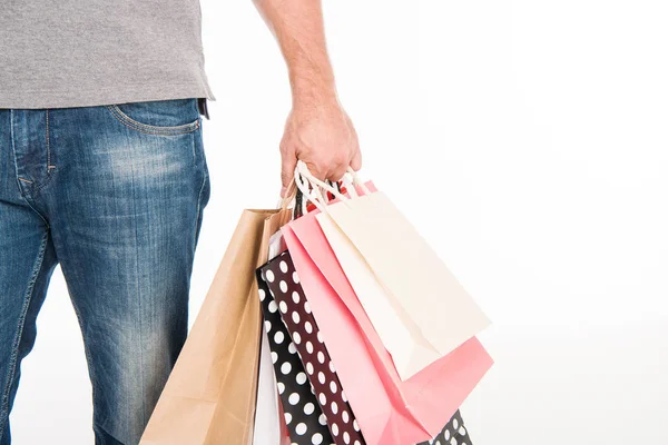 Homme avec des sacs à provisions — Photo de stock