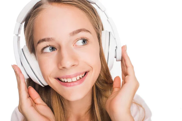 Teenager listening music with headphones — Stock Photo