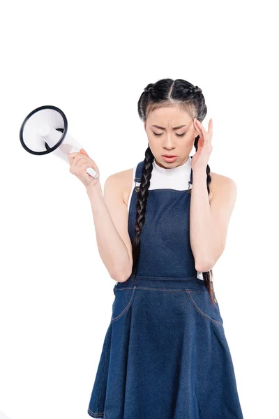 Tired asian woman with loudspeaker — Stock Photo