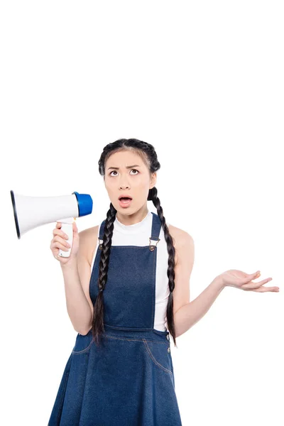 Confused asian woman with loudspeaker — Stock Photo