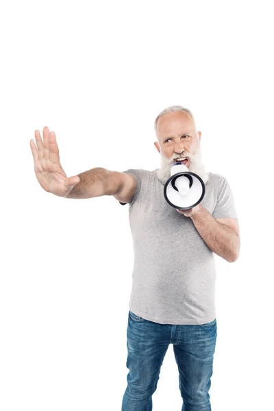 Shouting senior man with loudspeaker — Stock Photo