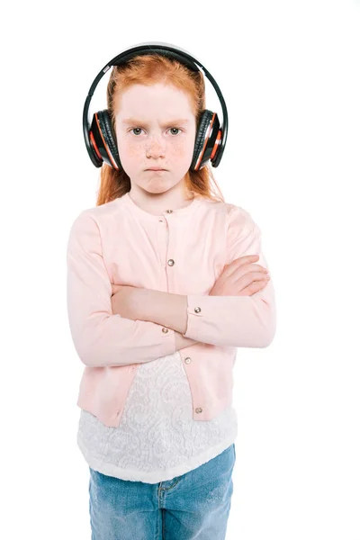 Дитина слухає музику з навушниками — стокове фото