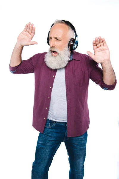 Homme âgé avec écouteurs — Photo de stock