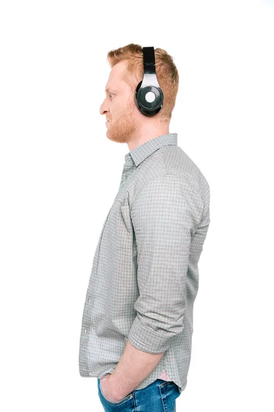 Homme écoutant de la musique avec écouteurs — Photo de stock