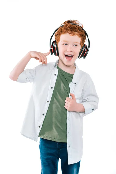 Kid listening music with headphones — Stock Photo