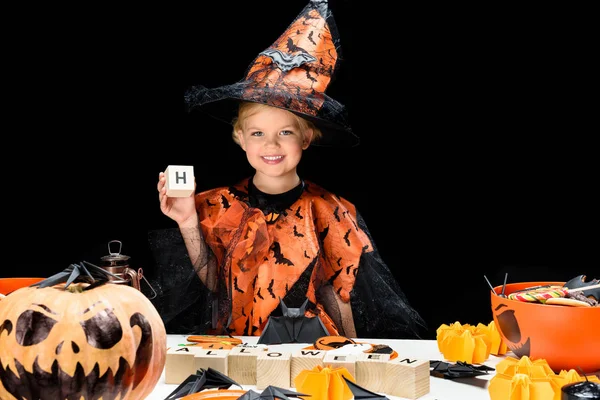 Kid in costume of witch — Stock Photo