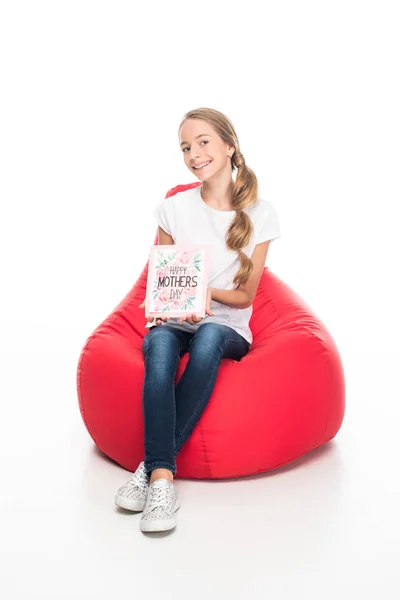 Teenager with greeting card for mothers day — Stock Photo
