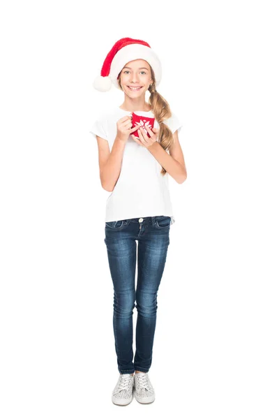 Adolescente em chapéu de Santa com café — Fotografia de Stock