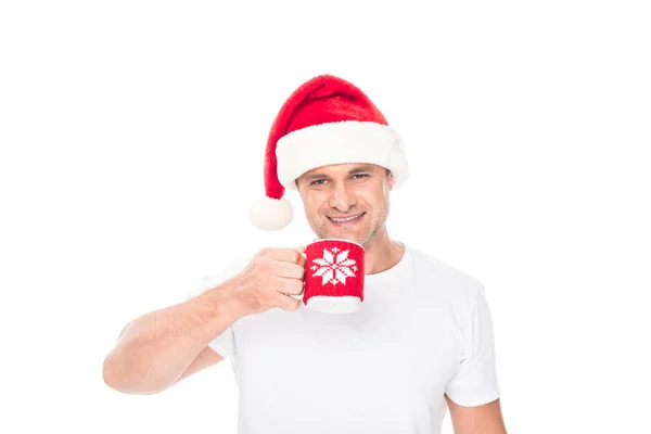 Homem em Santa chapéu com café — Fotografia de Stock
