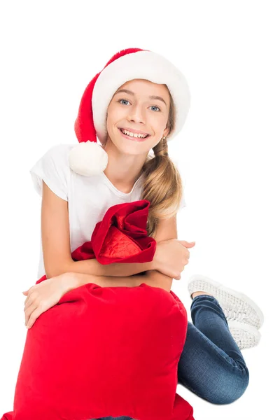 Adolescente sorridente com saco de Natal — Fotografia de Stock