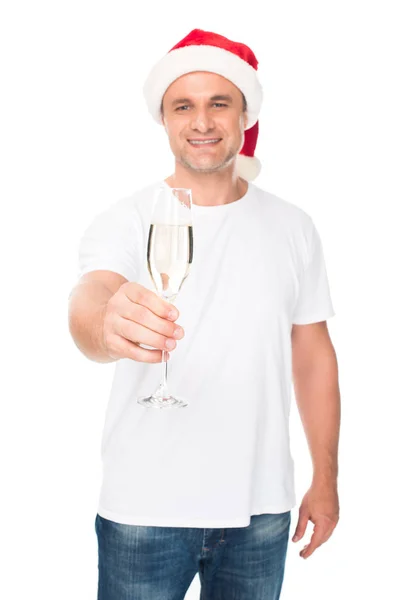 Человек в шляпе Санты с шампанским — стоковое фото
