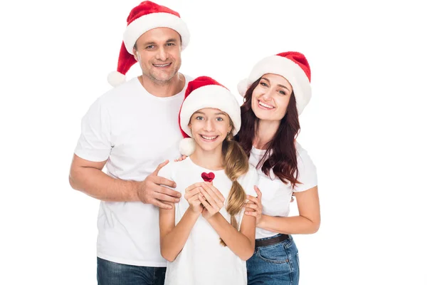 Família feliz em chapéus de Santa — Fotografia de Stock