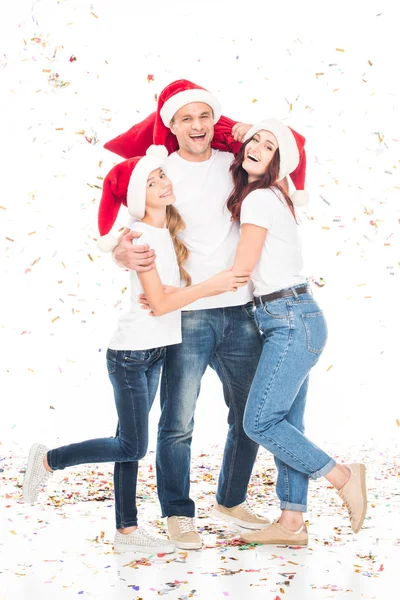 Familia con confeti de Navidad - foto de stock