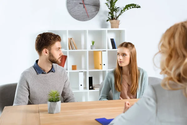 Young couple and psychologist — Stock Photo