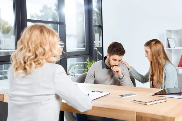 Young couple and psychologist — Stock Photo