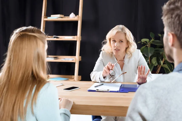 Young couple and psychologist — Stock Photo