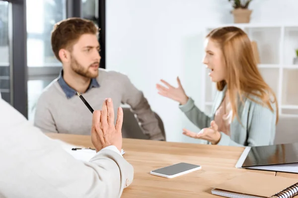 Young couple and psychologist — Stock Photo