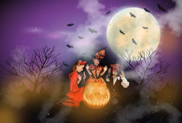 Devil, witch and pirate at halloween night — Stock Photo