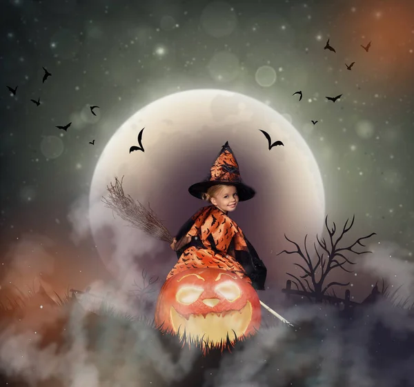Witch on big jack o lantern — Stock Photo